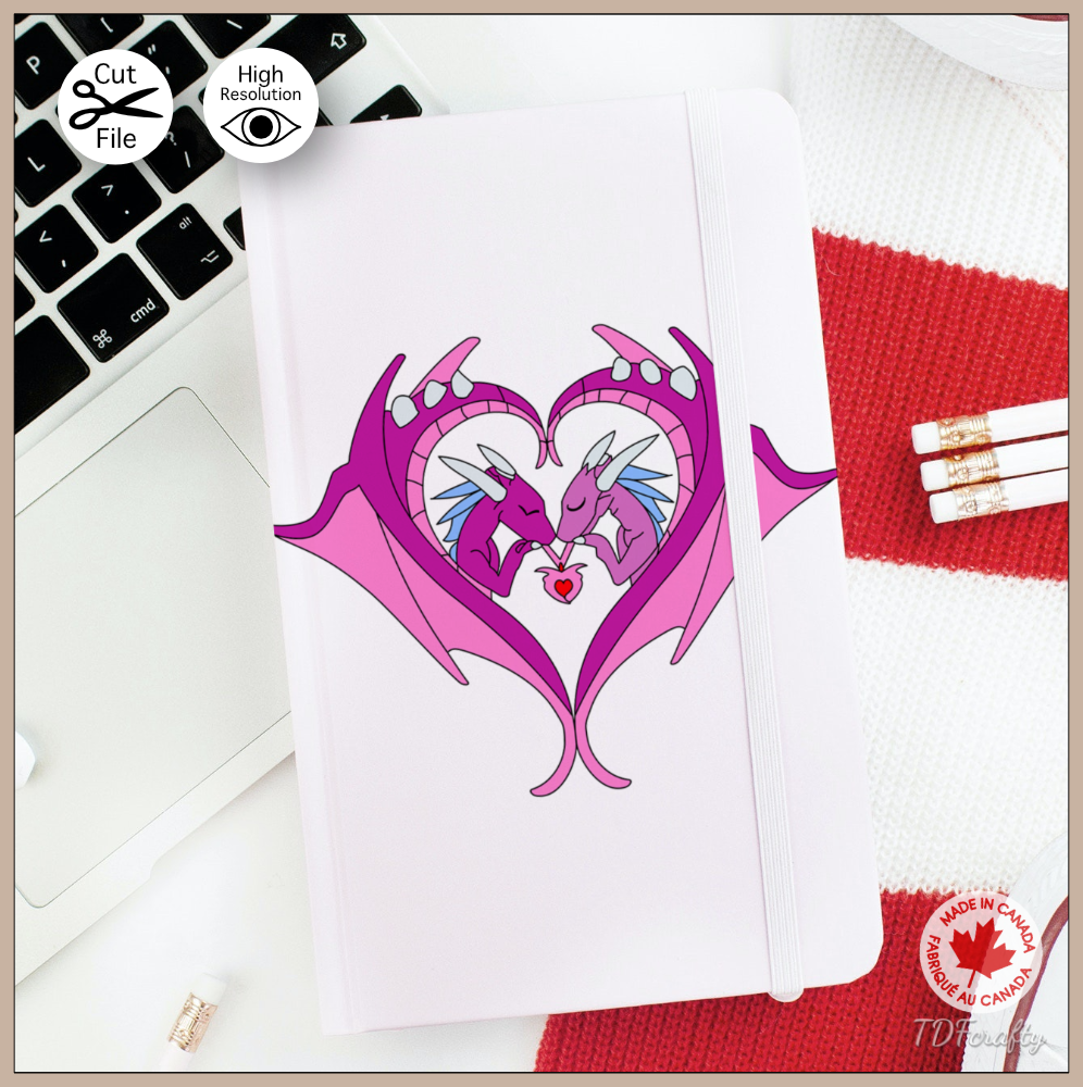 This is a digital illustration of a Two violet and pink dragon interlaces with their wings forming a heart. Shown here on a book.
