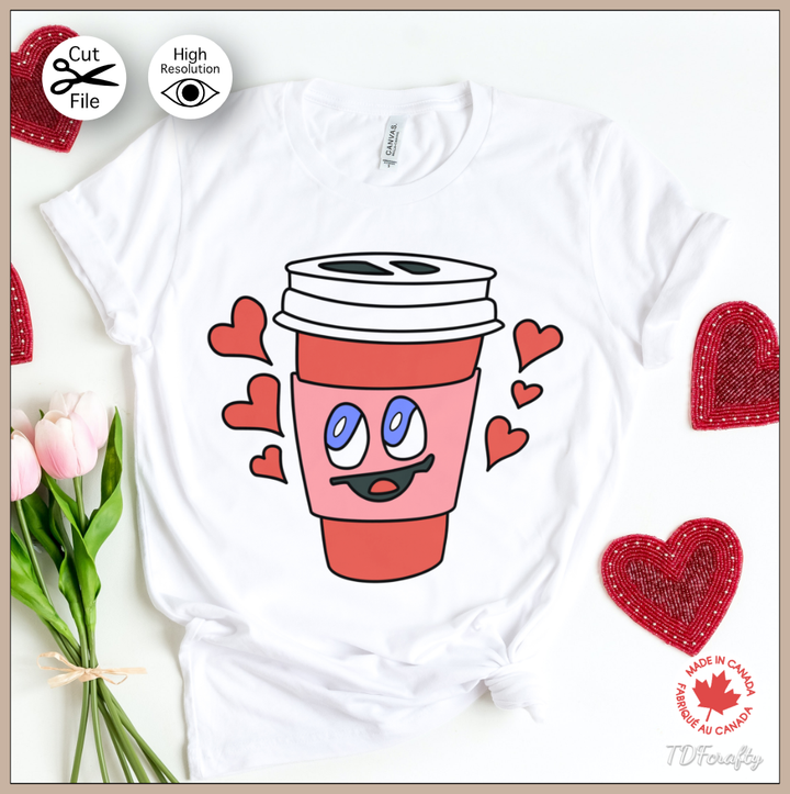 This is a digital illustration of a red to go coffee cup with a smiling face on it. On this image it is displayed on a shirt.