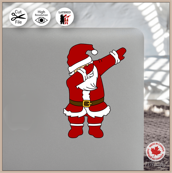Dabbing Santa cut file design in jpg, png, svg, eps, dxf, ai, psd, pdf shown as a sticker on a laptop