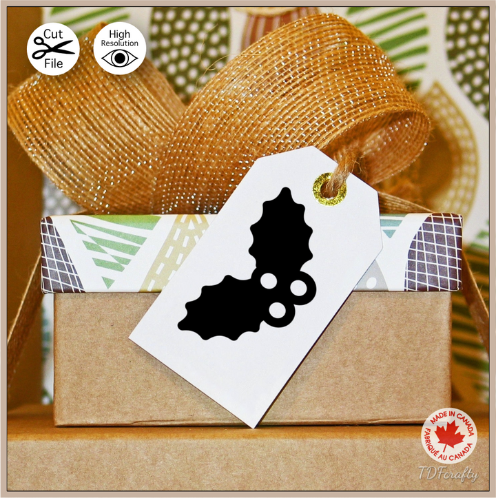 Holly silhouette cut file design in jpg, png, svg, eps, dxf, ai, psd, pdf shown as a gift tag printable.